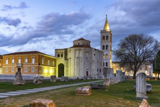 The Church of St Donatus, remains of the Roman forum and the bell tower of Zadar Cathedral at dusk,