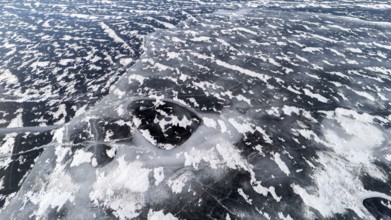 Frozen lake in early winter. Region of La Mauricie. Province of Quebec. Canada