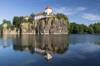 Kirchbruch lake and mountain church with water tower, Beucha, Leipzig district, Saxony, Germany,