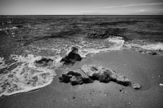 Rocks on the beach of Nea Kallikratia, Chalkidiki, Halkidiki, Macedonia, black and white, Greece,