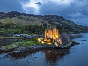 Night over Eilean Donan Castle and Loch Duich from a drone, Isle of Skye, Highlands, Scotland,