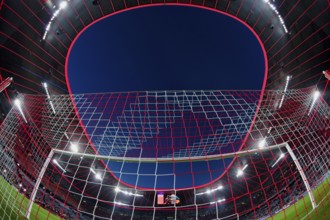 Overview, interior, floodlit match, behind-the-goal perspective, goal net, blue hour, fisheye shot,