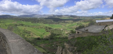 View to the west from the Puente Nuevo, New Bridge, Ronda, Malaga, Spain, Europe