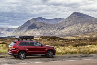 4x4 cars in Glen Etive Valley, Highlands, Scotland, UK