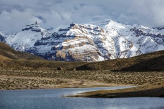 Himalayas mountains and mountain lake Dhankar Lake. Spiti Valley, Himachal Pradesh, India, Asia