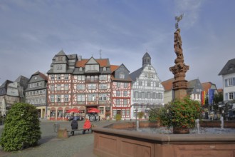 Historic half-timbered houses and market fountain, Haus Zum goldenen Löwen built in 1709 with slate