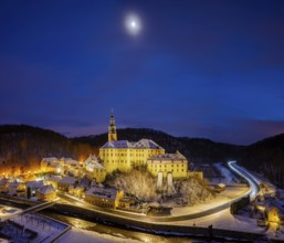 Winter evening in the Müglitz valley, impressively illuminated Weesenstein Castle at the blue hour,