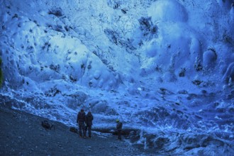Tourists inside an ice cave, glacier cave, Vatnajökull, Iceland, Europe