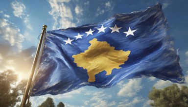 Flags, the national flag of Kosovo flutters in the wind