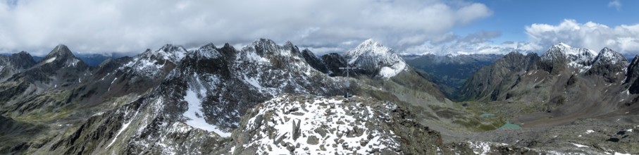 Panorama, mountaineer at the summit Keeskopf with summit cross, mountain landscape with snow,
