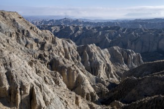 Wide hilly desert landscape with dry vegetation, Gorafe desert, semi-desert, Granada, Andalusia,