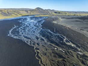 Aerial view, glaicial streams flow across Mælifellssandur, black sand desert, Icelandic highlands,