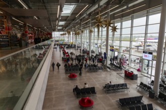Departure lounge aircraft boarding area inside Tirana International Airport Nënë Tereza, Mother
