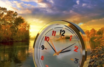 Symbol photo, clock, time, clock face, time, season, sunset, lake, landscape, sensation, sense of