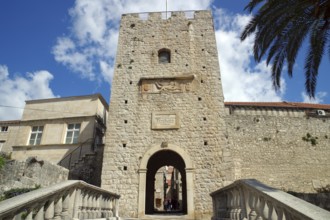 Stairs and medieval city gate leading into the old town of Korcula, Marco Polo, Adriatic Sea,