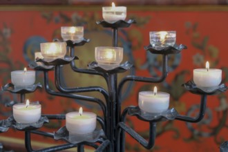 Burning sacrificial candles in a church, Münsterland, North Rhine-Westphalia, Germany, Europe