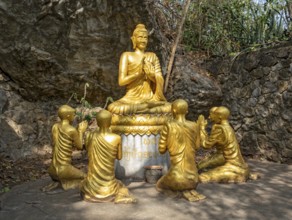Statue of Buddha teaching disciples, Phousi or Phu Si Hill, Luang Prabang, Laos, Asia