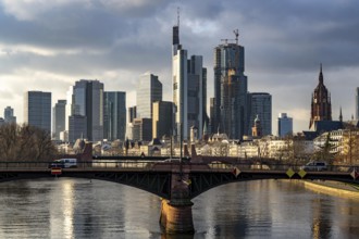 Skyline of the city centre of Frankfurt am Main, river Main, Ignatz-Bubis-Bridge, dusk, Hesse,