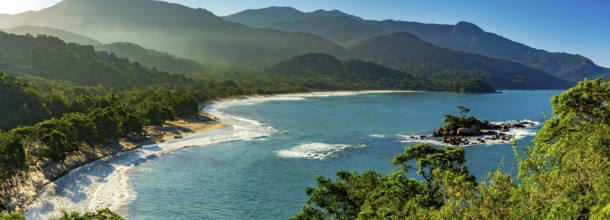 Panoramic image of Castelhanos beach between the sea, mountains and forests of the island of