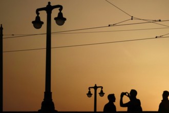 Tourists on the Augustus Bridge in Dresden, sunset, Saxony, Germany, Europe