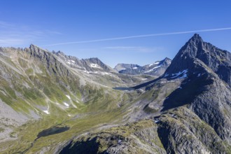 Aerial view of a glacial, u-shaped valley and peak of Mt. Slogen, above village Urke at the