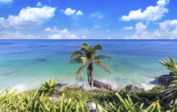 Mexico, Tulum Archaeological Zone and Mayan pyramids on scenic ocean shore, Central America