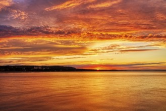 Impressive sunset over the sea with warm colours, Rügen