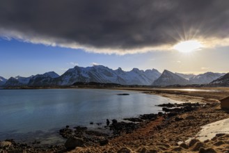 Cloudy mood at the sea in front of Bergen, sunbeams, Moskenesoya, Lofoten, Norway, Europe