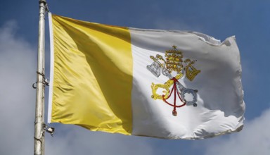 Flags, the national flag of the Vatican, Vatican State fluttering in the wind