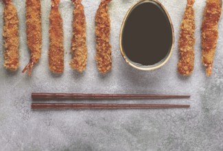 Fried tiger prawns in tempura, top view, soy sauce, chopsticks