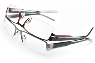 Two stylish glasses from JAGUAR on a white background, studio shot