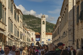 Main promenade Stradun or Placa and the landmark bell tower in Dubrovnik, Croatia, Europe