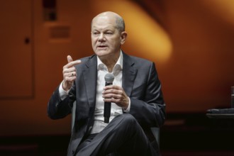 Discussion panel Olaf Scholz (SPD), Federal Chancellor, with author Juli Zeh (not pictured) in