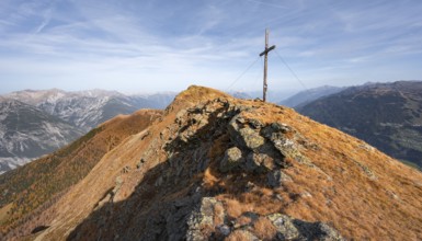 Summit cross on the ridge of the Venet, in autumn, Venet crossing, Ötztal Alps, Tyrol, Austria,