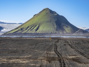 Mælifell mountain covered with moss, Maelifell, black sand desert Mælifellssandur, glacial streams,