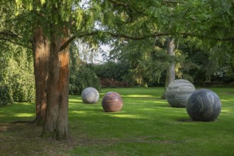 Sculpture Pars pro Toto, stone balls by Alicja Kwade, Sculpture Park, Louisiana Museum of Modern