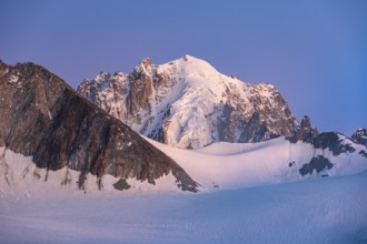 High alpine mountain landscape at sunset, Glacier du Tour, glacier and mountain peak, summit of the