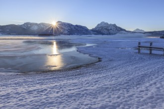 Sunrise at a lake in front of mountains, footbridge, snow, winter, Forggensee, Königswinkel, view