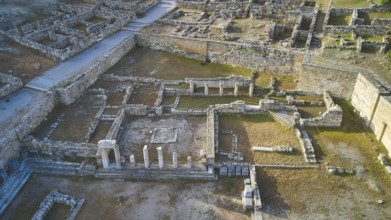 Drone shot, first morning light, Ancient ruins with structural remains in an archaeological site in