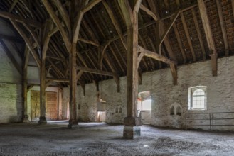 Interior showing wooden truss of 13th century Gothic monastic tithe barn of the Ter Doest Abbey at