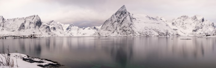 Panoramic picture, snowy mountains at the fjord, Hamnøy, Reine, Moskenesøya, Lofoten, Norway,