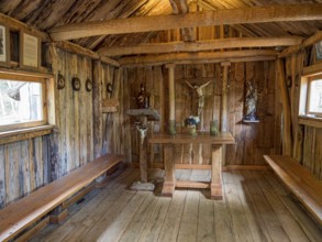 Interior of wooden chapel built by padre Ronchi, near Villa o' Higgins, Patagonia, Chile, South