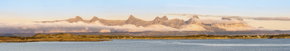 Panorama view of mountain chain 'seven sisters' near Sandnesssjøn, Helgeland, Norway, Europe