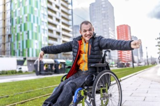 Young disabled man is joyfully navigating the city in his wheelchair, embracing independence and