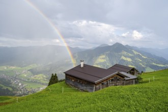 Alpine huts, view over the Brixen Valley with rainbow, Hochbrixen, Brixen im Thale, Kitzbühel Alps,
