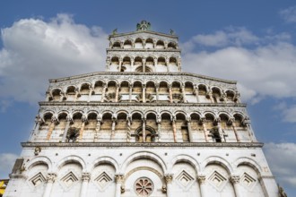 Round arches on the façade of the church of San Michele in Foro, historic city centre, Lucca,