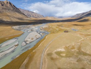 Aerial view, Burkhan mountain valley with meandering river, barren dramatic mountain landscape,