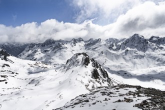 View at the summit of Piz Laviner, mountain panorama in winter, mountain landscape with mountain
