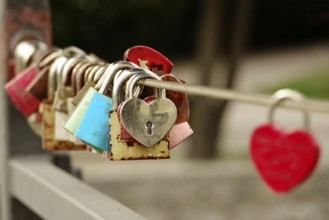 Love locks on a bridge railing, Bavaria, Germany, Europe
