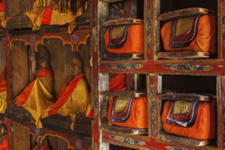 Folios of old manuscripts in library of Thiksey Gompa (Tibetan Buddhist Monastery) . Ladakh, India,